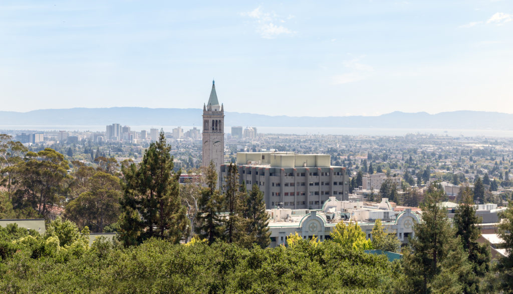 Tower at the University of California, Berkeley against the Berkeley city skyline