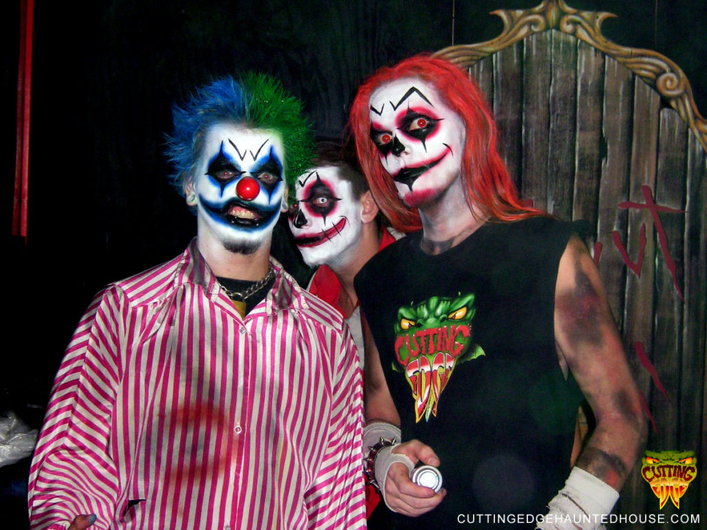 Three people dressed as clowns Cutting Edge haunted house in Texas