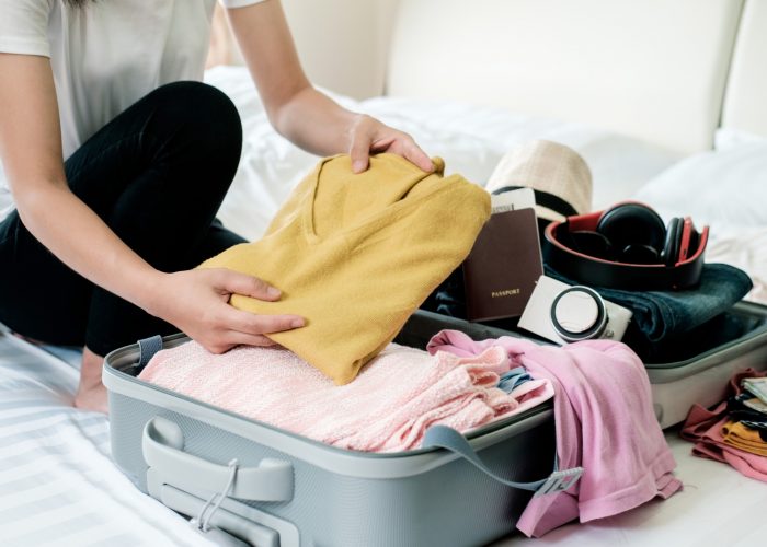 packing wrinkle free clothes in a suitcase